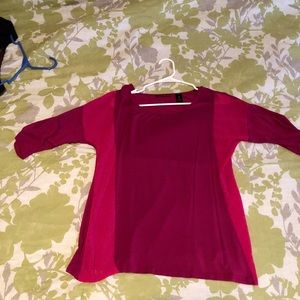 Bright pink 3/4 sleeved shirt.